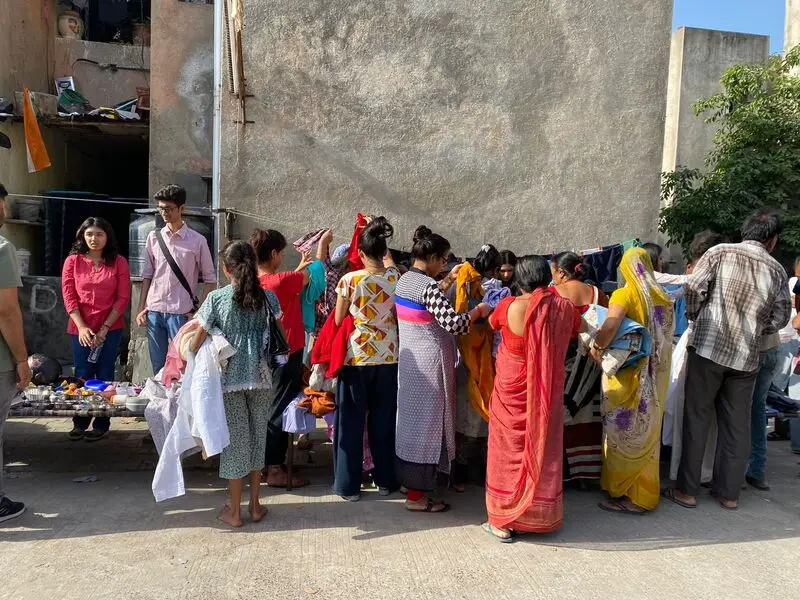 Sorting and cleaning donated clothes