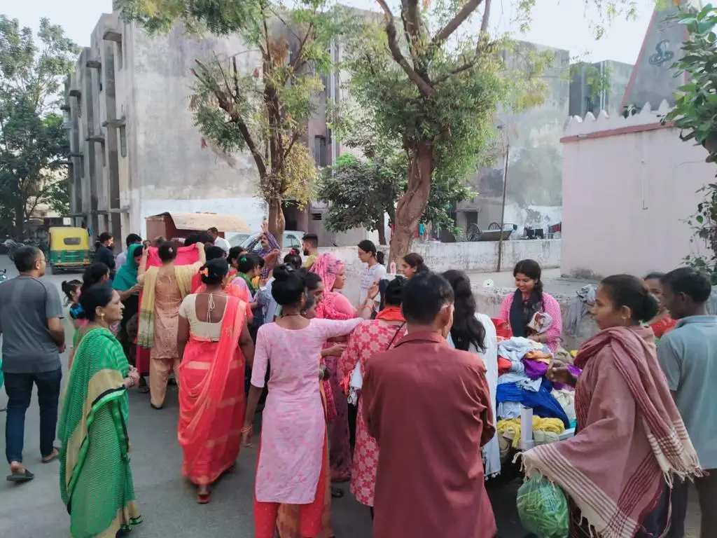 Volunteers preparing clothes